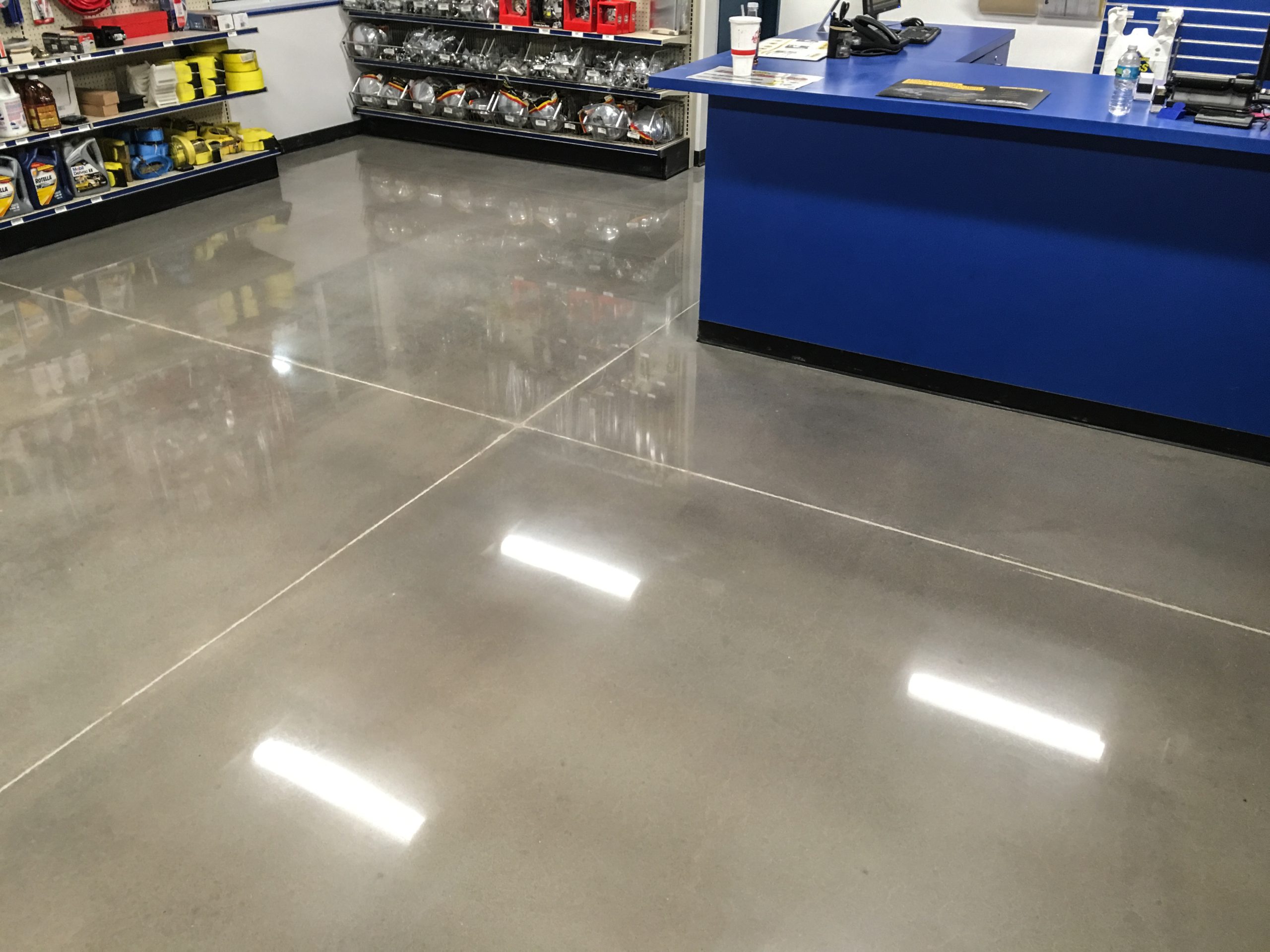 Polished concrete and epoxy in retail showroom, Las Colinas Irving TX