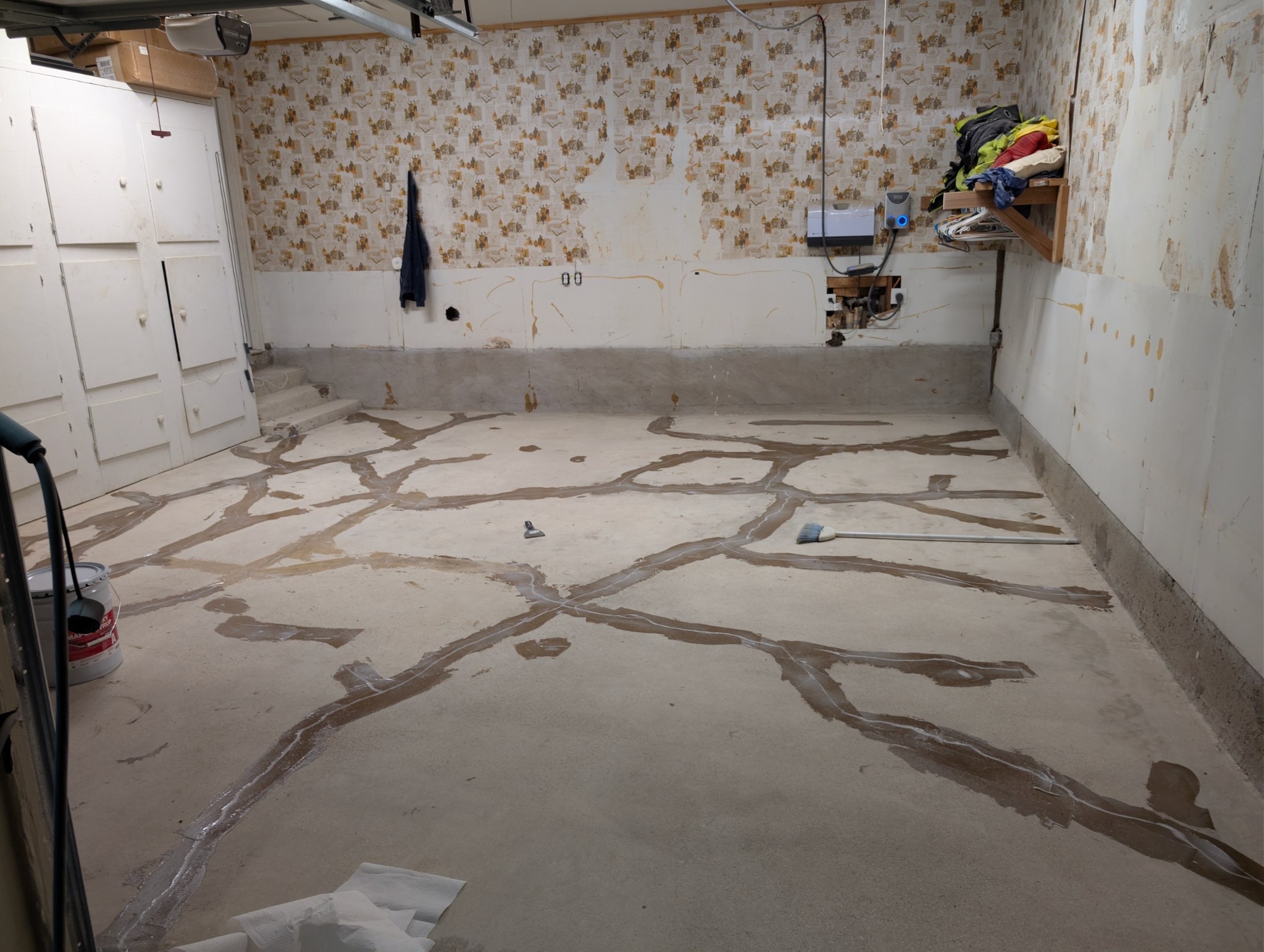 Repaired and filled slab cracks on a prepped garage floor in Carrollton, TX