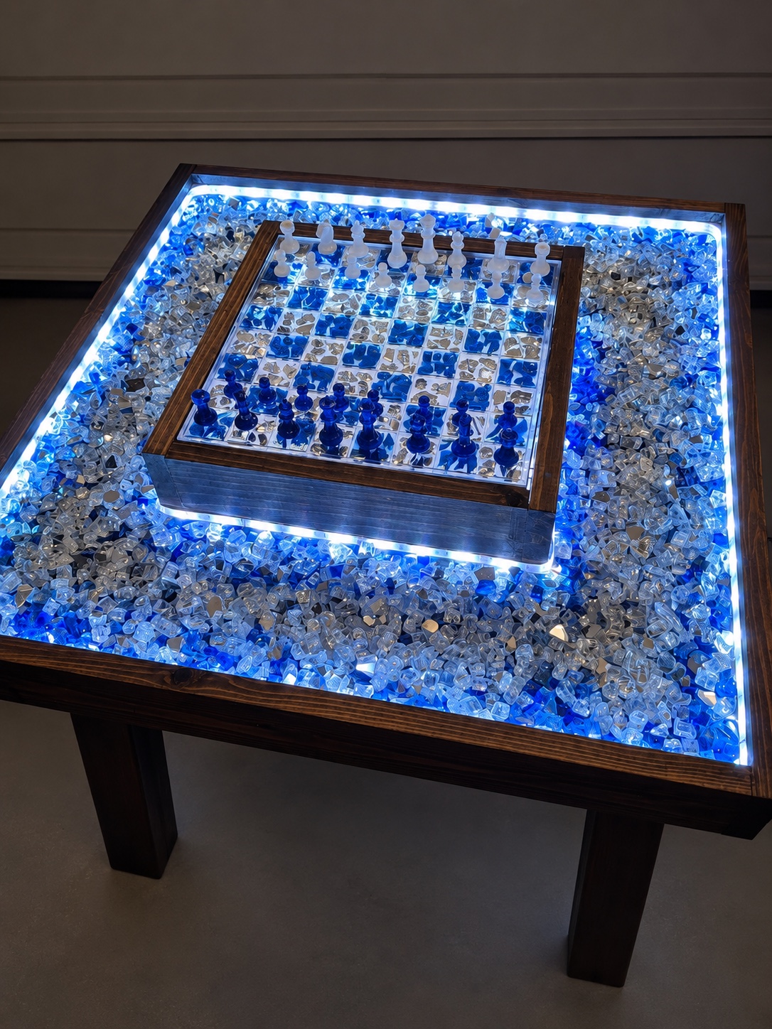 LED lit epoxy resin chess table with lighting cast into the piece, custom shop build for a Collin County TX client